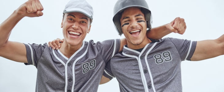 Two cheering baseball fans